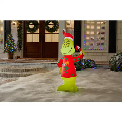 4 Ft. LED Grinch in Ugly Sweater with Candy Cane Christmas Airblown® Inflatable